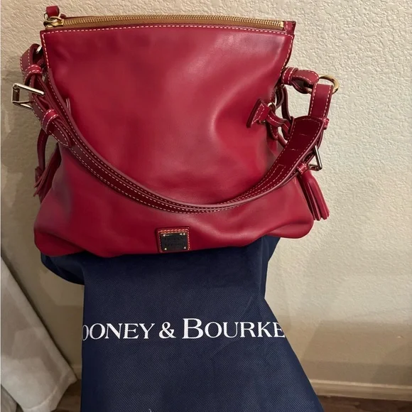 Dooney & Bourke's Teagan Mulberry Purse. - Picture 1 of 16